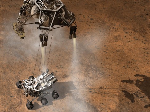 Artist's concept depicts the moment that NASA's Curiosity rover touches down onto the Martian surface
