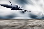 Military airplane flying at speed, via Bigstock.com