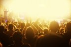 bigstock-Orange-toned-image-of-audience-19499027