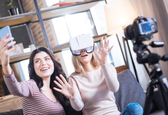 Delighted young woman wearing 3d glasses