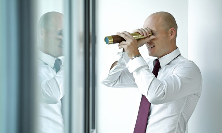 businessman spy glass