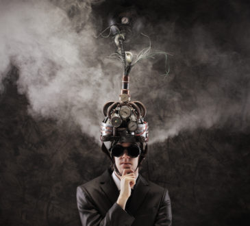 Business man wearing a brain-control helmet, forced ideas extraction